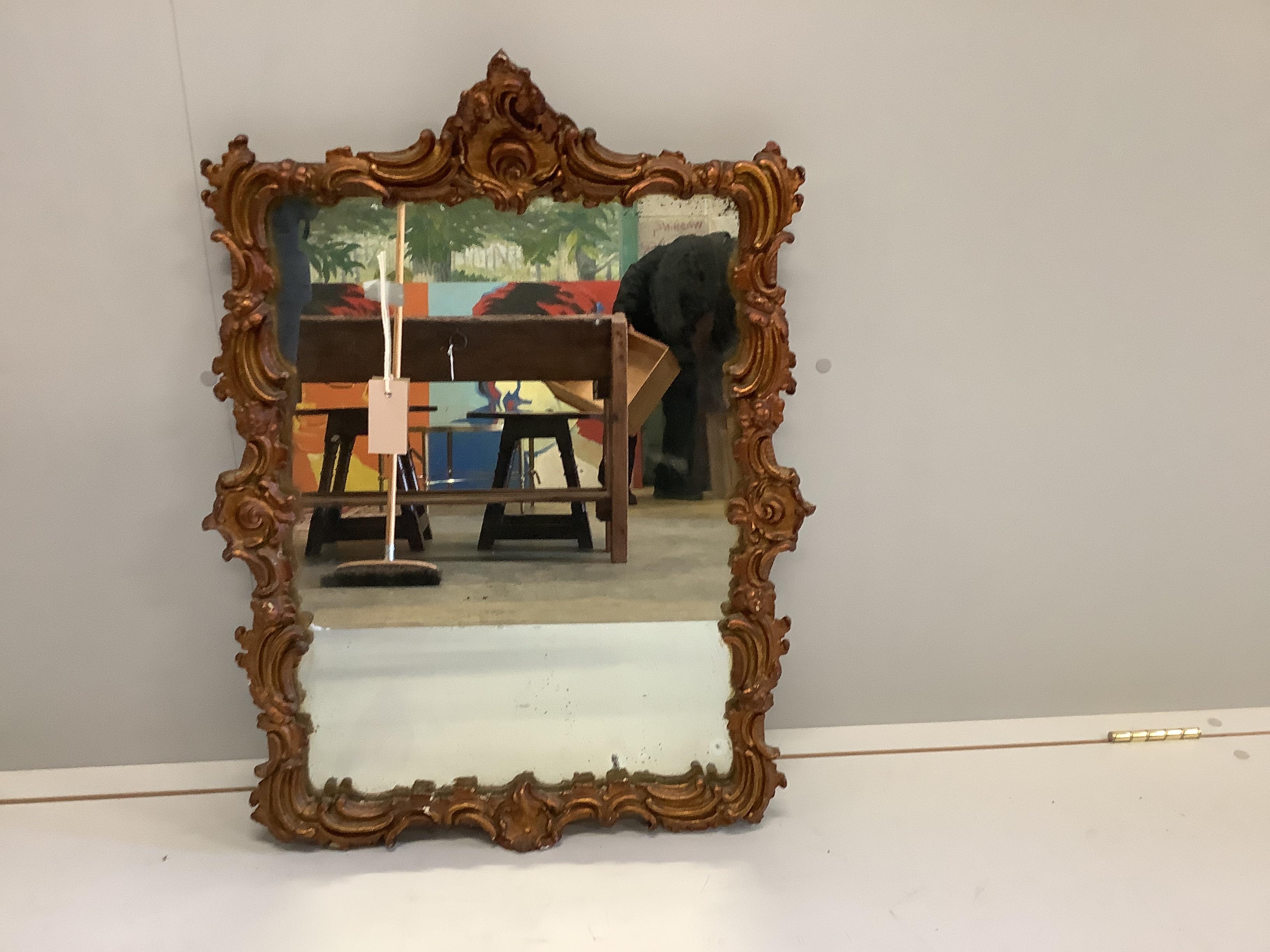 A Victorian style giltwood and composition rectangular wall mirror, width 54cm, height 76cm